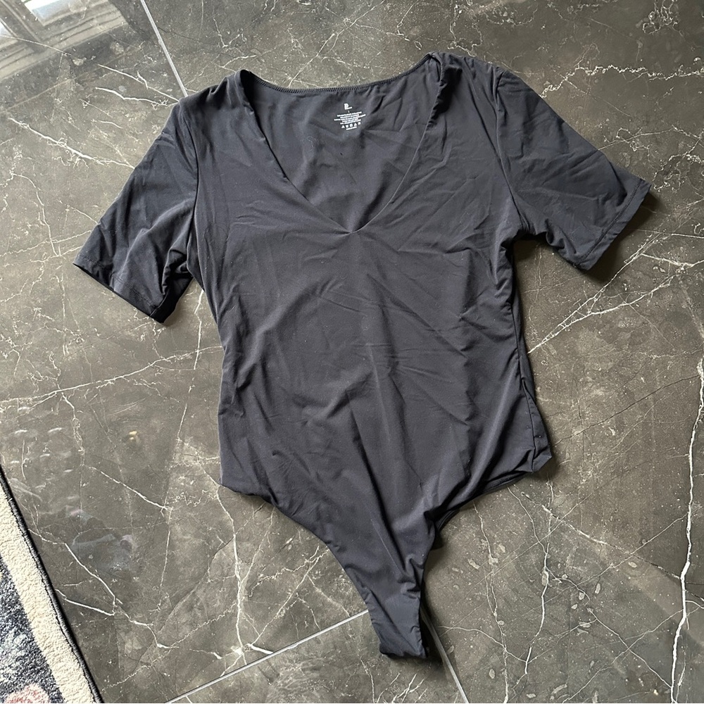Black short sleeve bodysuit never worn